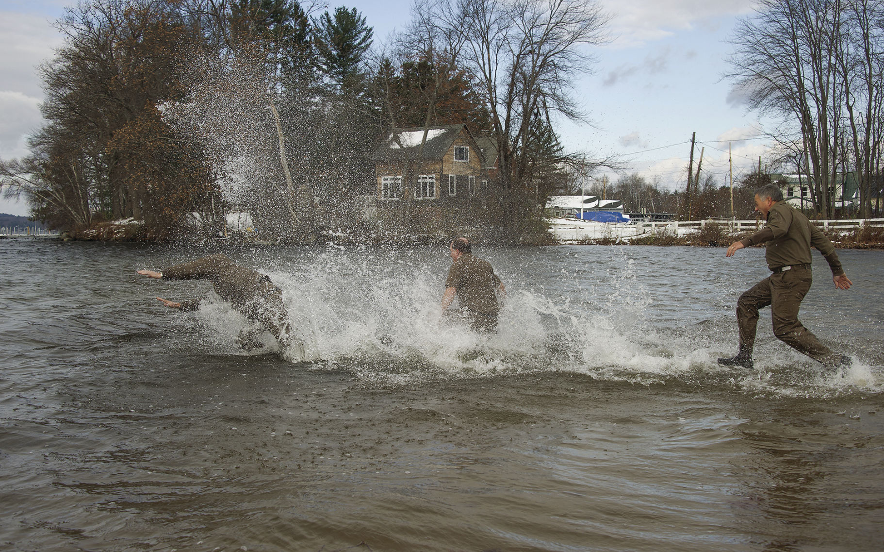UPS drivers plunge into frigid water for Salvation Army